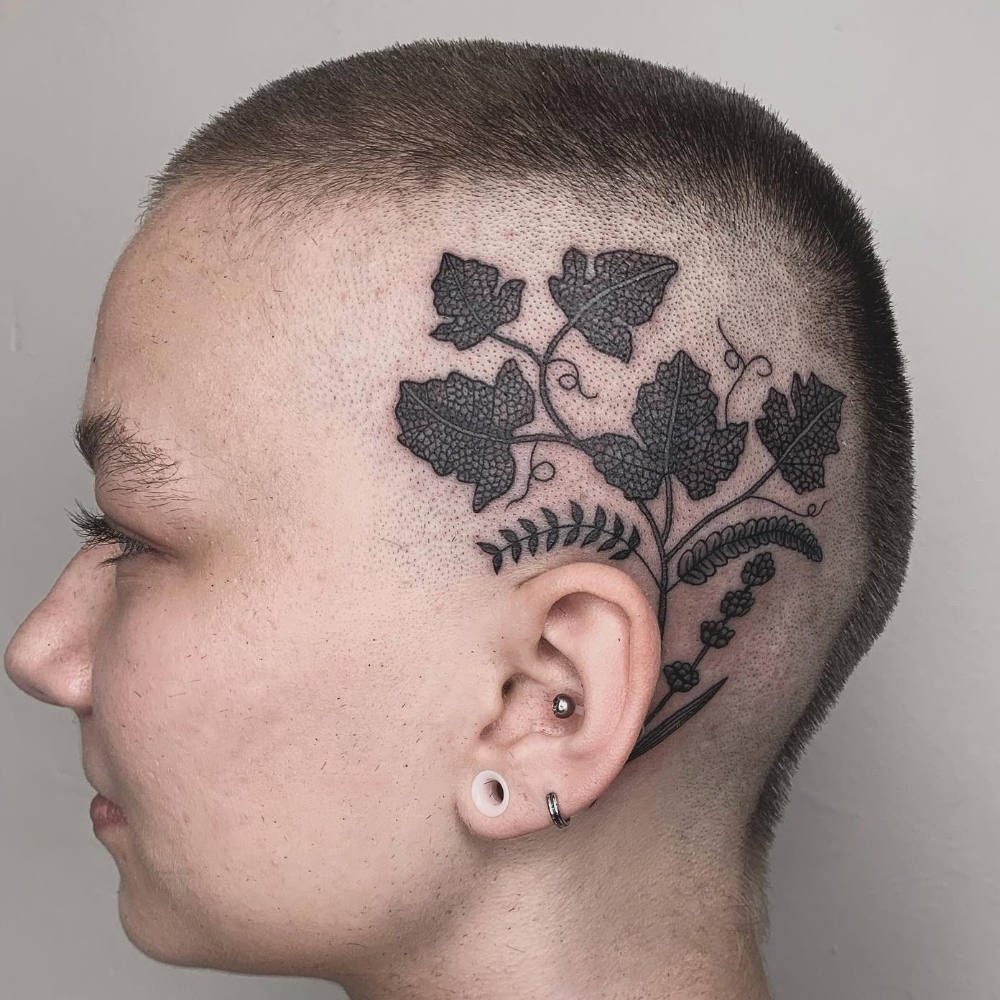 tattooed-arm-of-a-hairdresser-RVTKGR5-r22o8c593yt2s8d1i8m03un4o1